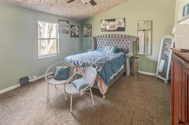 bedroom with lofted ceiling, ceiling fan, a textured ceiling, and carpet