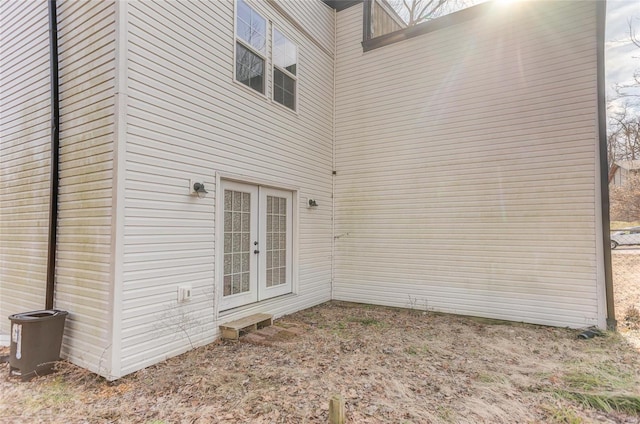 view of side of property featuring french doors