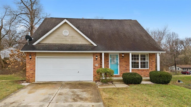 view of front of property featuring a garage and a front lawn