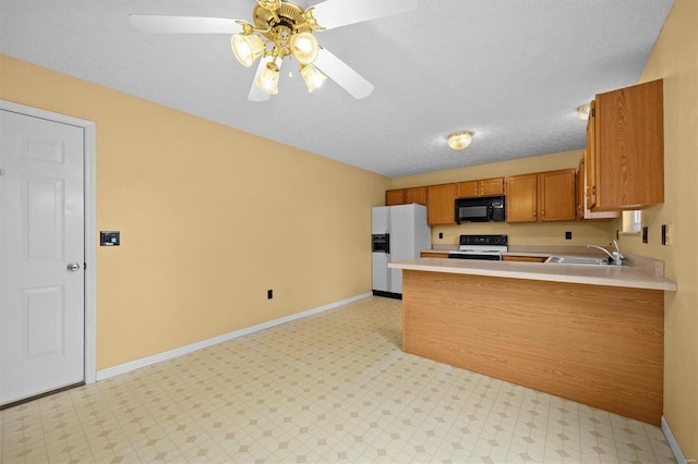 kitchen featuring sink, a textured ceiling, electric range oven, kitchen peninsula, and white fridge with ice dispenser