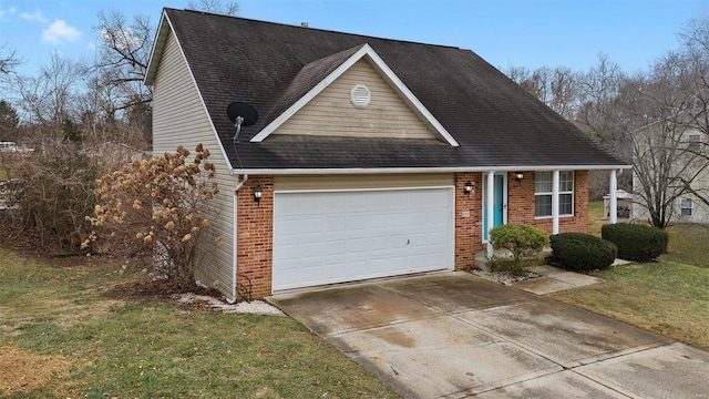 view of front facade with a garage and a front lawn