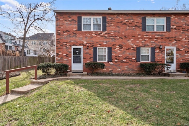 view of front of home with a front yard