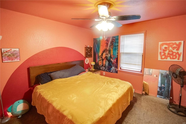 bedroom featuring ceiling fan and carpet flooring