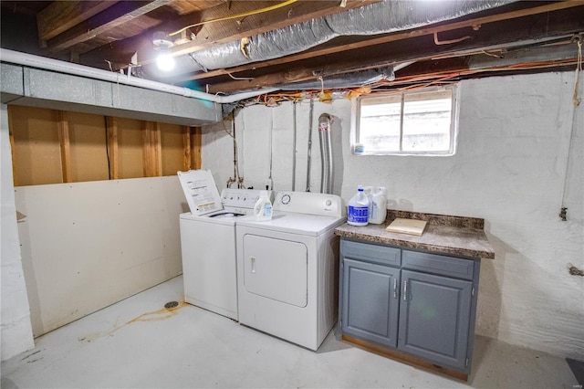 laundry area with independent washer and dryer