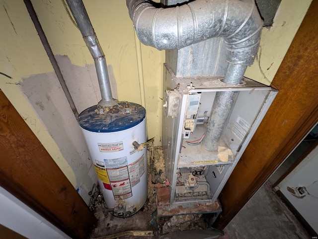 utility room with water heater