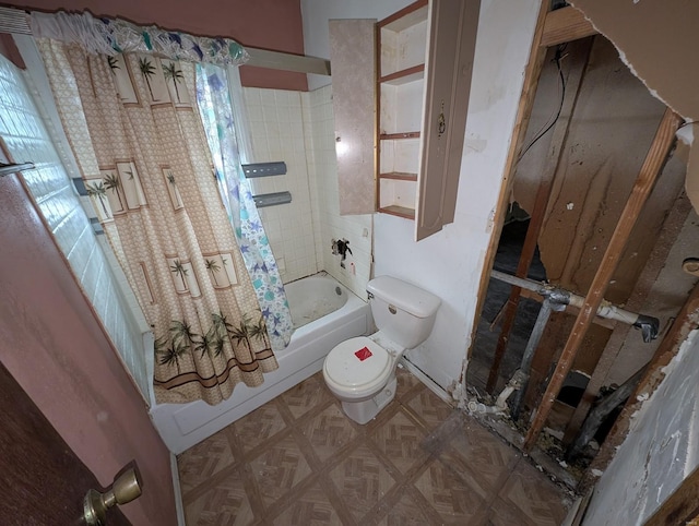 bathroom featuring shower / bath combination with curtain and toilet