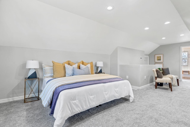 bedroom featuring vaulted ceiling, carpet flooring, and baseboards