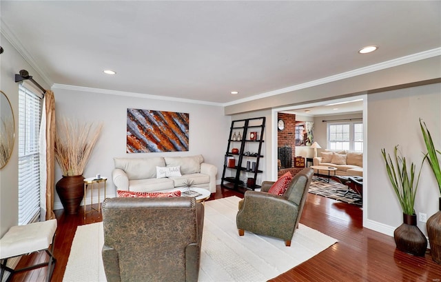 living room featuring crown molding and dark hardwood / wood-style flooring