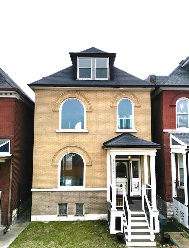 view of front of property with brick siding