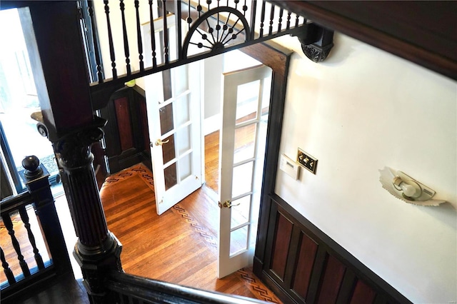 interior space with french doors and wood finished floors