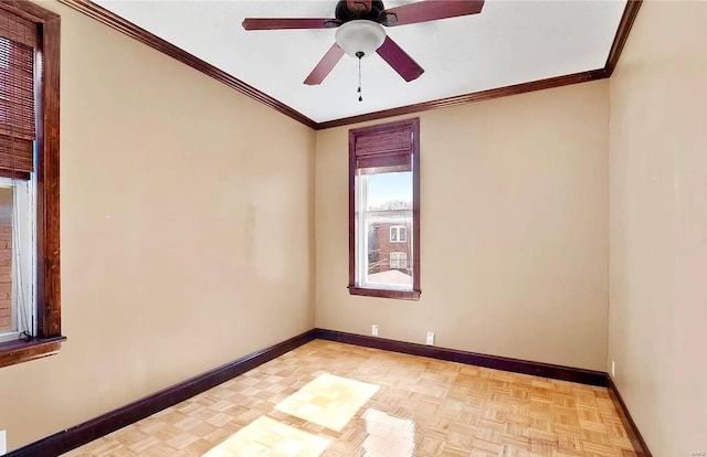 empty room featuring baseboards, a ceiling fan, and ornamental molding