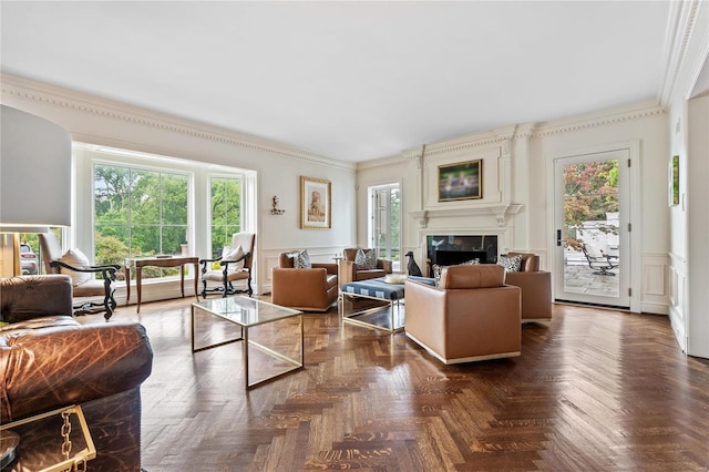 living room featuring ornamental molding and dark parquet floors