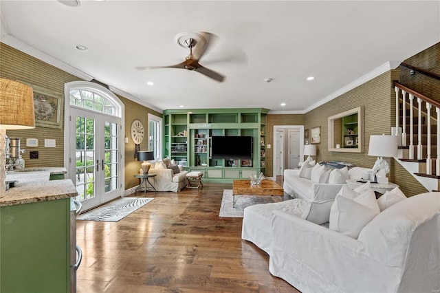 living room with french doors, ceiling fan, ornamental molding, and dark hardwood / wood-style flooring