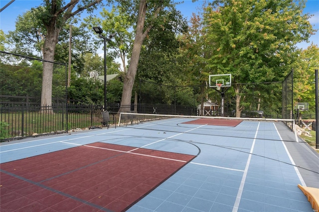 view of sport court featuring tennis court