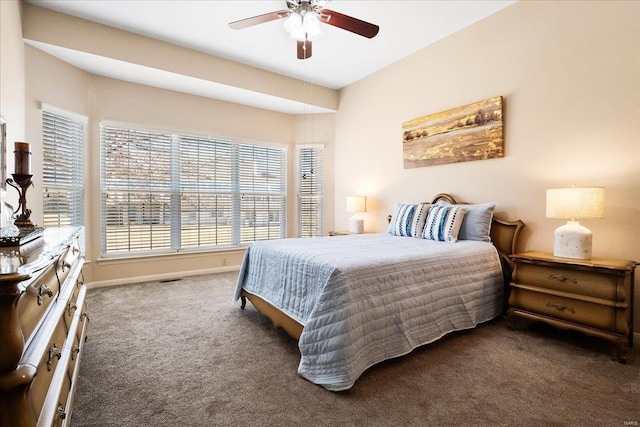 bedroom with carpet, ceiling fan, and baseboards