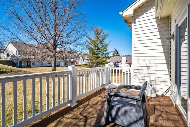 wooden deck with a residential view