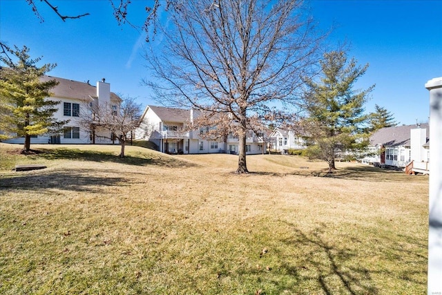 view of yard featuring a residential view