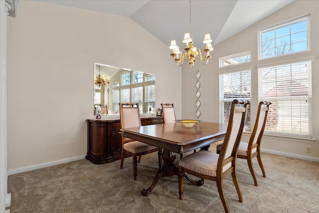 dining area featuring an inviting chandelier, baseboards, high vaulted ceiling, and light colored carpet