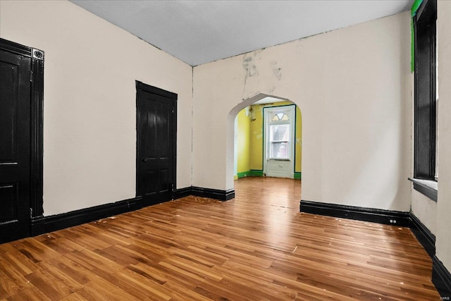 empty room featuring hardwood / wood-style flooring