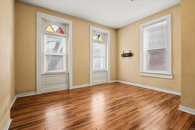 doorway to outside with hardwood / wood-style floors