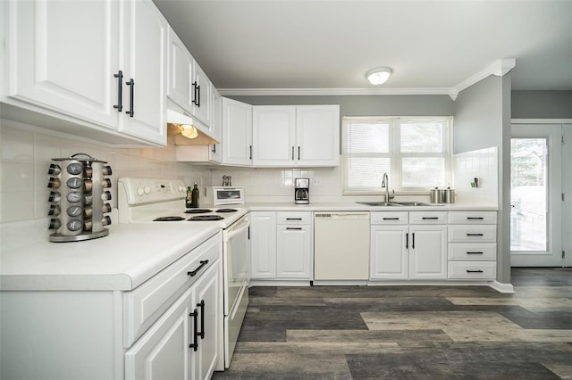 kitchen featuring white cabinetry, sink, white appliances, and decorative backsplash