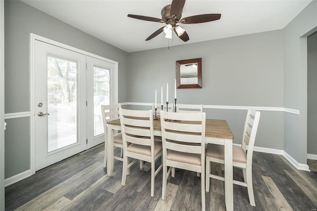 dining area featuring ceiling fan and dark hardwood / wood-style flooring