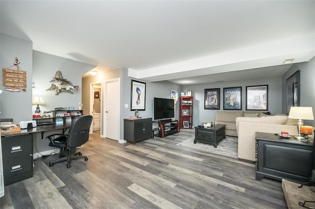 office with wood-type flooring