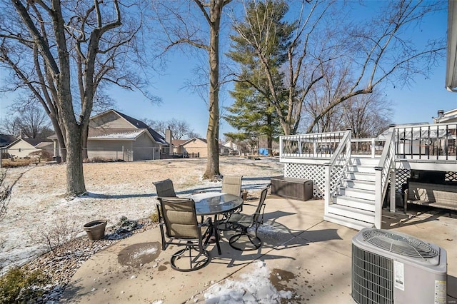 view of patio featuring a deck and central air condition unit