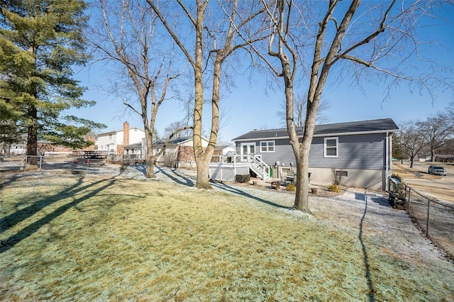 view of yard featuring a wooden deck