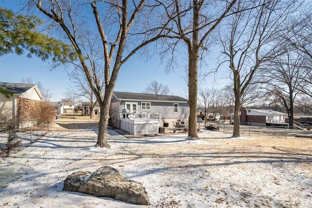 view of front of home with a wooden deck