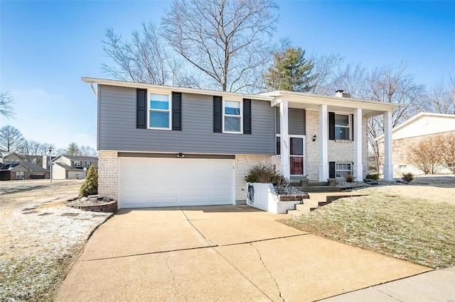 split foyer home featuring a garage