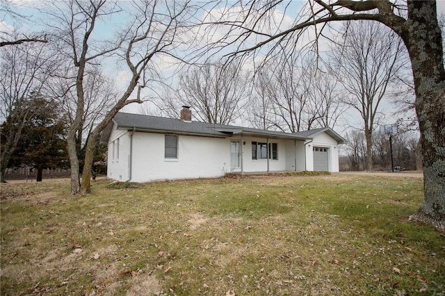 ranch-style house with a garage, brick siding, a chimney, and a front yard