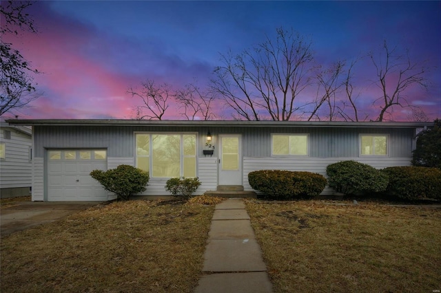 single story home with a garage