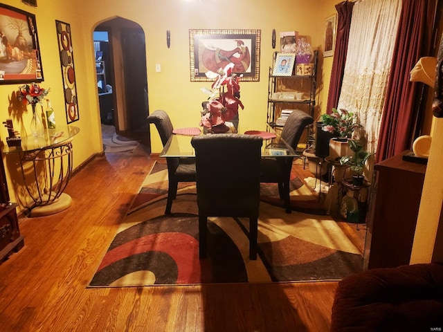 dining space with light hardwood / wood-style flooring