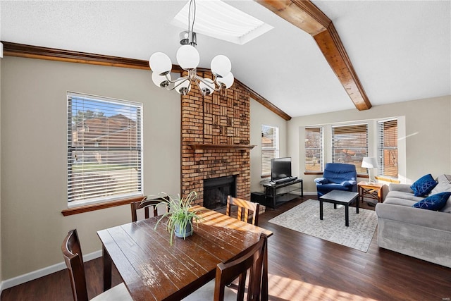 dining area with an inviting chandelier, vaulted ceiling with beams, dark hardwood / wood-style floors, and a brick fireplace