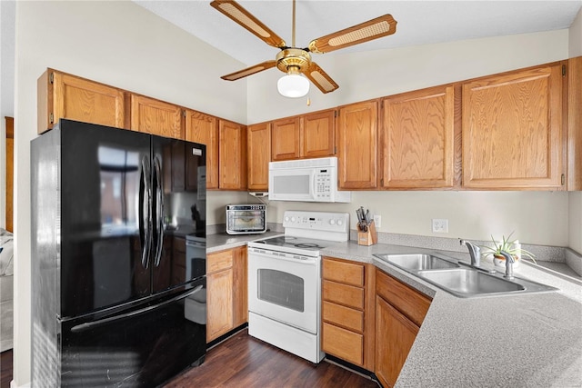 kitchen with sink, white appliances, ceiling fan, dark hardwood / wood-style flooring, and vaulted ceiling