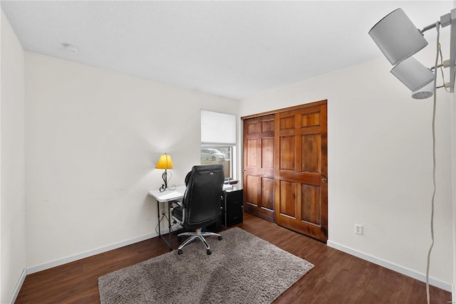 office area with dark wood-type flooring