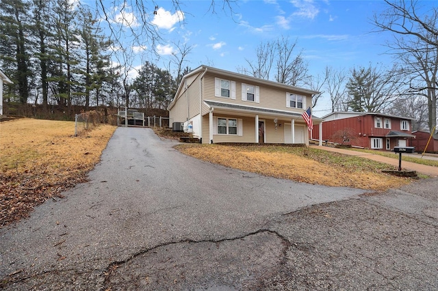 front of property featuring central AC unit