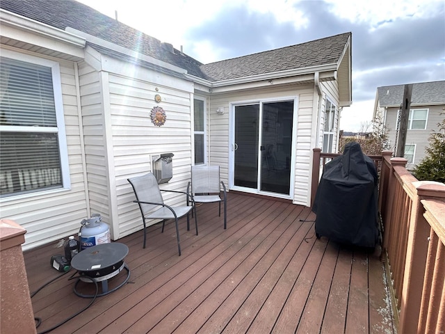 deck featuring a grill