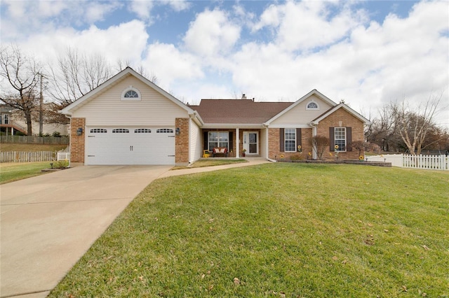 ranch-style home featuring a garage and a front yard