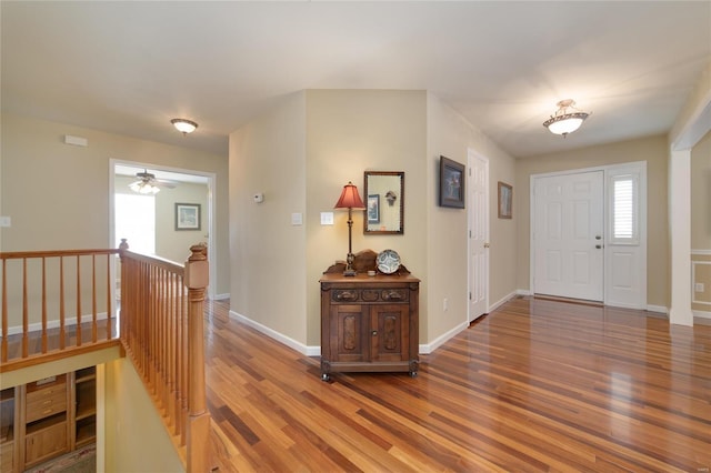 foyer entrance with hardwood / wood-style floors and plenty of natural light