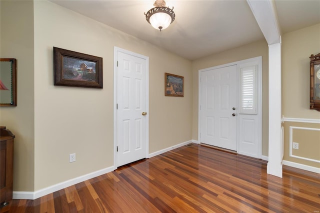 foyer featuring dark hardwood / wood-style floors