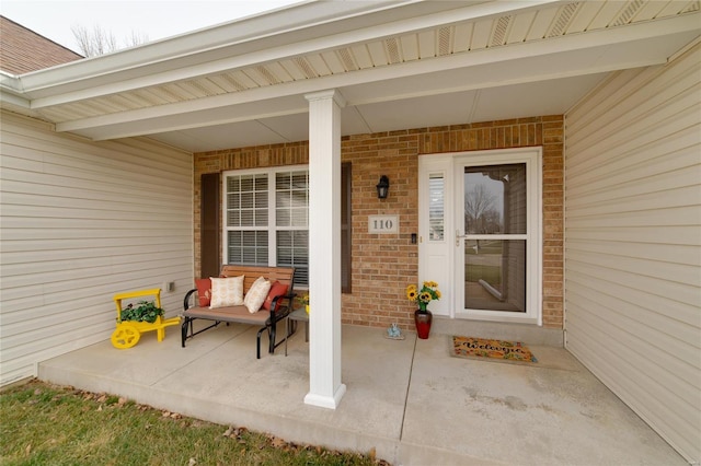 entrance to property with a porch