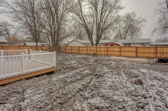 view of yard with a wooden deck