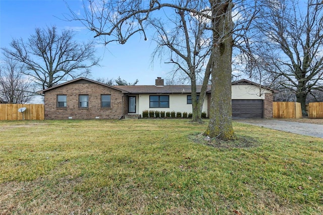 single story home with a garage and a front yard