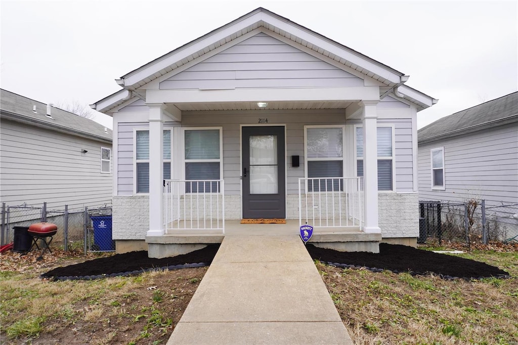 view of front of home featuring covered porch