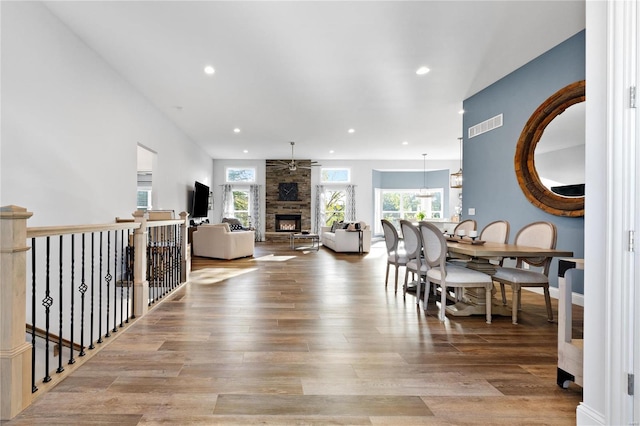 interior space with a large fireplace and light wood-type flooring