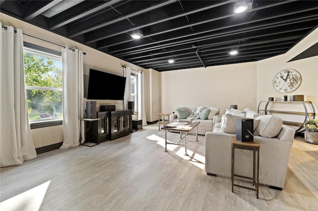 living room with light hardwood / wood-style flooring