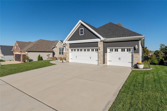 view of front of property with a garage and a front lawn