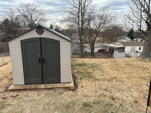 view of outdoor structure featuring a yard